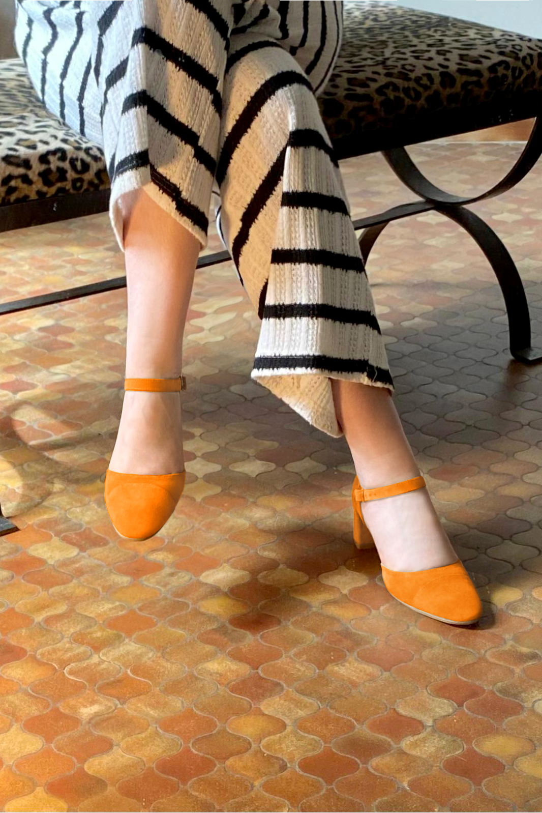 Apricot orange women's open side shoes, with an instep strap. Round toe. Medium block heels. Worn view - Florence KOOIJMAN